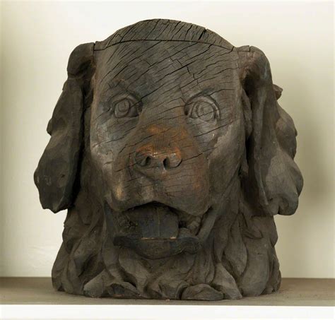 Carved Dog Heads Art Uk