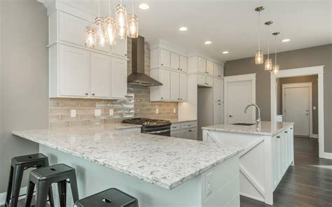 When do you use the. Alaskan White Granite Countertops - Iowa Remodels