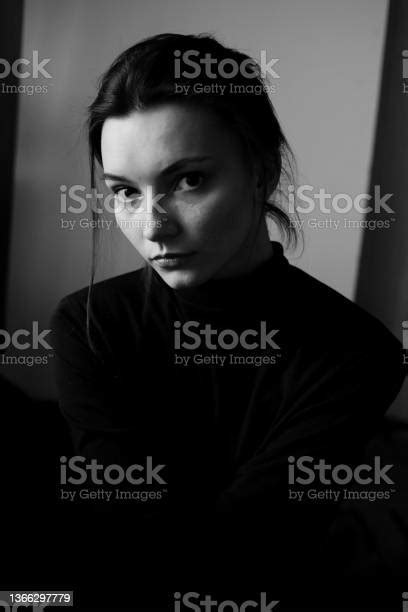 Black And White Portrait Of Young Beautiful Woman In Profile Stock