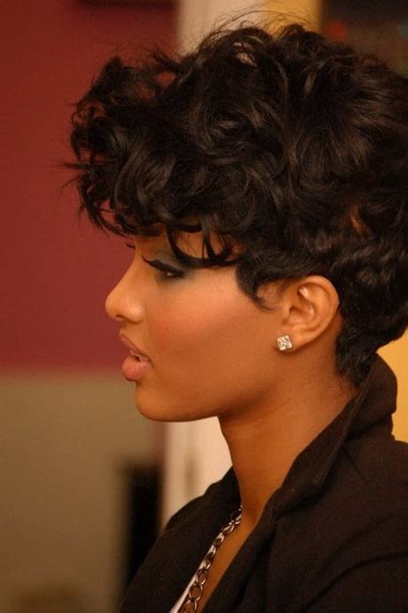 Nice curls with red highlights add this pixie style a really stylish vibe. Short black curly hairstyles