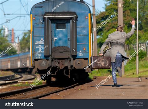 Man Trying Catch Train Man Late Stock Photo 1608158923 Shutterstock