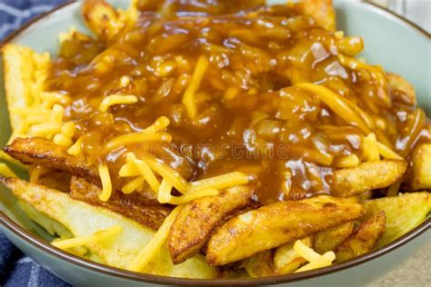 Canadian Dish Poutine Fries Cheddar And Brown Sauce Stock Image