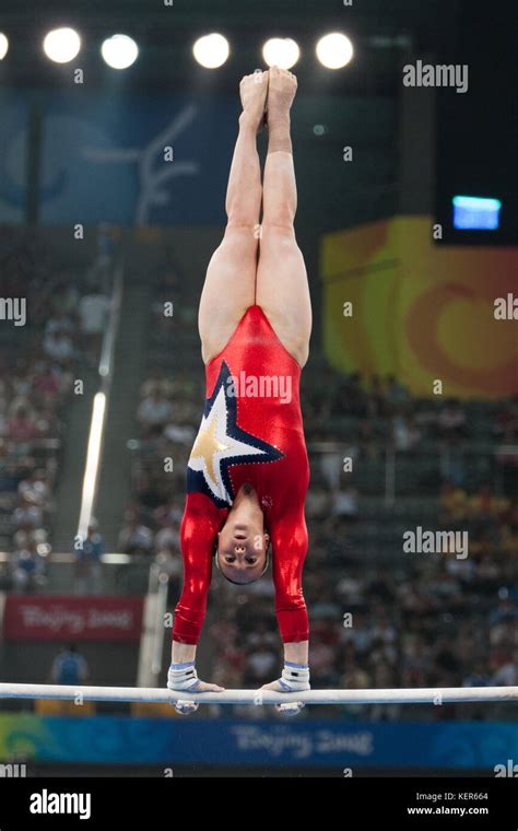 Chellsie Memmel Usa Competing On The Uneven Bars In The Women