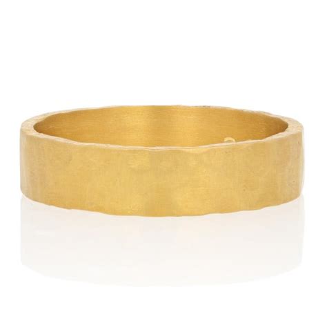 24 karat gold is a measure of purity, not weight. Custom Hammered Band, 24 Karat Yellow Gold Wedding Ring For Sale at 1stdibs