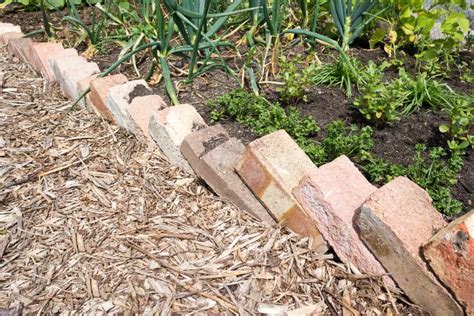 25 Ways To Reuse Old Bricks In Your Garden Brick Landscape Edging