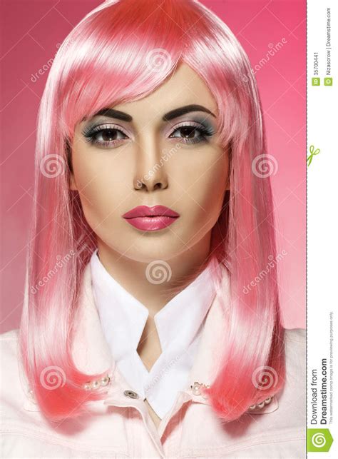 Beautiful Portrait Of A Girl With Pink Hair On A Pink