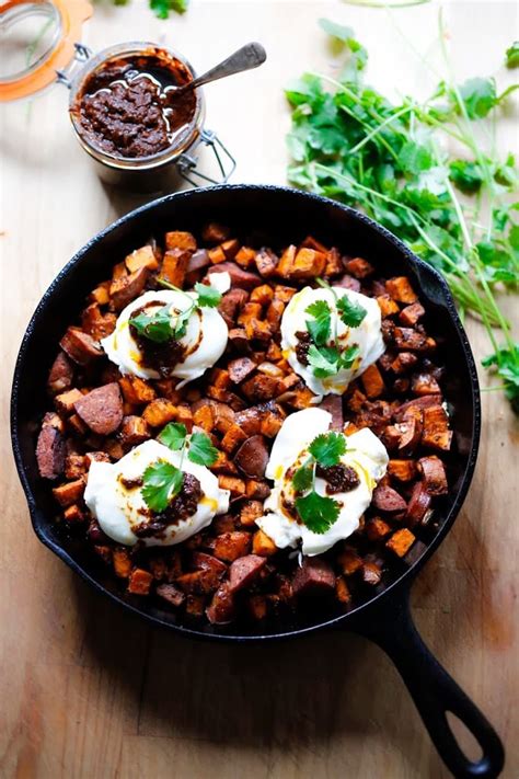 Sweet Potato Hash With Poached Eggs And Harissa Paste