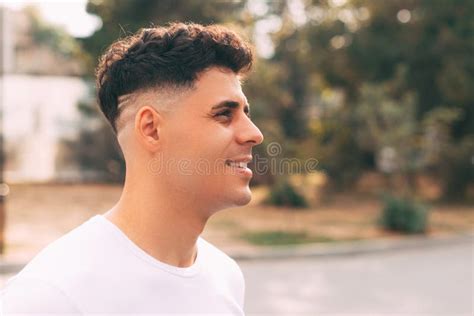 Side View Portrait Young Cheerful Man Looking Away While Standing