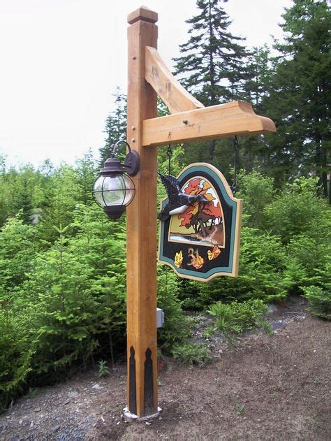 Timber Lamp Post With Sign And Light Like The Light And Plug Sign