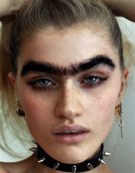 this model is embracing her unibrow eyebrow trends beauty trends crazy makeup