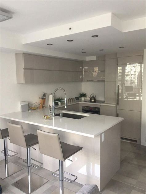 Diseño moderno de salón con comedor y cocina. Iluminación cocina #cocinasmodernas | Diseño cocinas ...