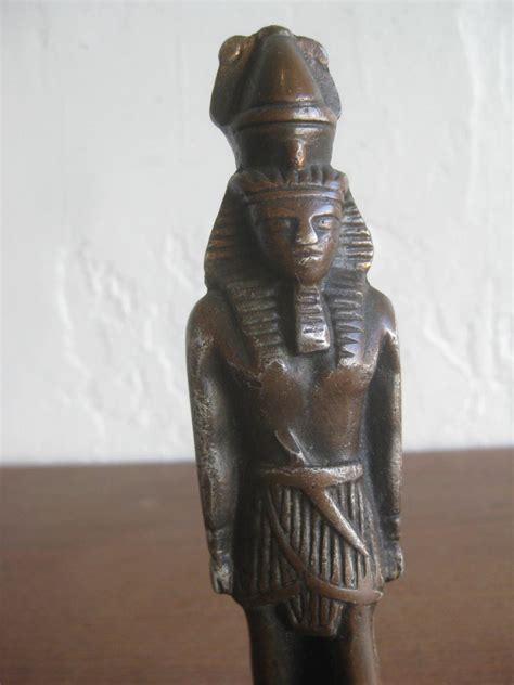 The egyptian revival decorative arts style was present in furniture and other household objects, as well as in architecture. Antique Art Deco Egyptian Revival Pharaoh Figural Aluminum ...
