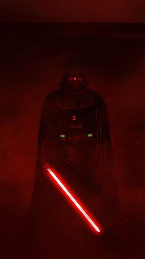 Download Darth Vader Unleashing His Red Lightsaber Wallpaper