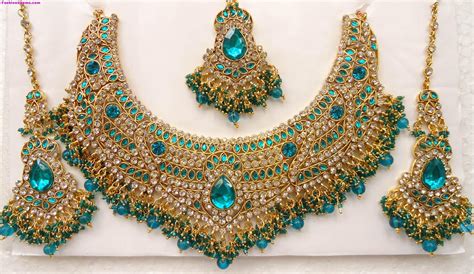 We did not find results for: The Latest Images of Gold Bridal Necklace Designs - HijabiWorld