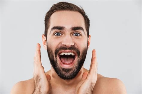 Premium Photo Close Up Of A Young Excited Handsome Bearded Shirtless