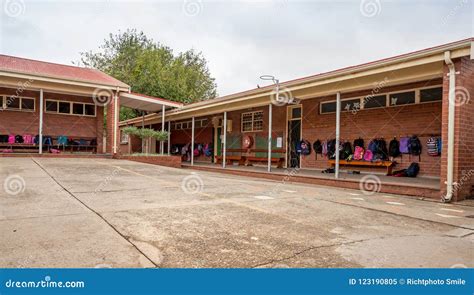 Primary School Buildings With Bags In Corridors Editorial Image