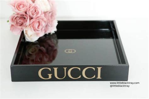 Choose personal conversation pieces that tell a story about you. Square Black Coffee Table Tray with Gucci in Gold #affiliate | Vanity tray, Designer tray, Black ...