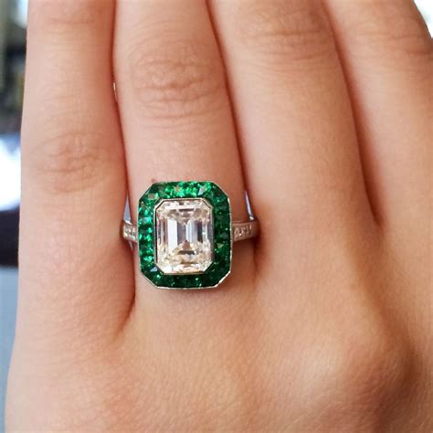 Platinum 251ct Emerald Cut Diamond Emerald Halo Engagement Ring