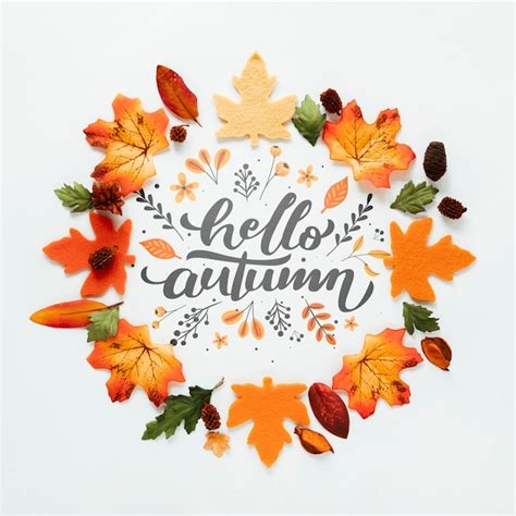 Free PSD | Hello autumn quote with leaves in orange shades
