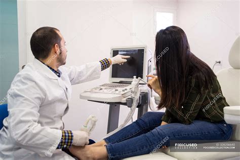 Medical Specialist Performing Ultrasound Examination — Diagnostic