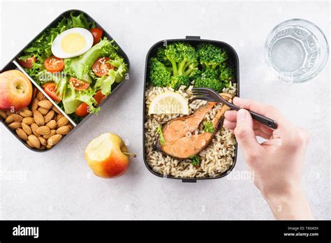 Man Eating Nutrition Lunch From Takeaway Lunch Box Healthy Diet