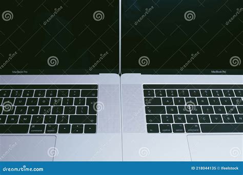 Comparing Of Laptops New Modern And Old Laptop Editorial Photo