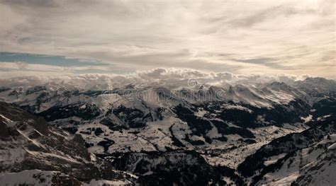 Snow Covered Swiss Alps From Above View Of Mountain Saentis Stock Photo