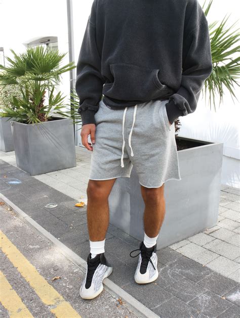 Essential Shorts Paired With The Washed Grey Hoodie Summer Outfits Men Shorts Men Fashion