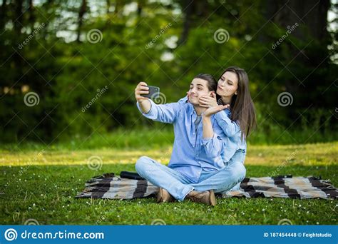 Lovely Couple Have Fun Together Sit On Plaid Outdoor Enjoy Sunny Warm