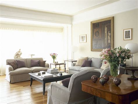 Brown tone comes from the flooring and the doors. Beige-Gray Traditional Family Room | Beige living rooms ...