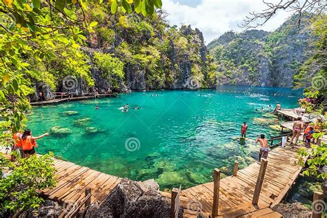 People Tourists Swimming At Kayangan Lake In Coron Island Palawan The