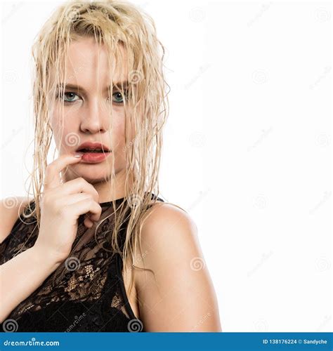 Glamor Beautiful Blonde Girl With Wet Hair And Skin Bright Makeup And Plump Lips With A Damp