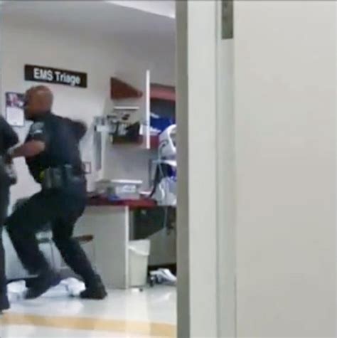 Detroit police officer suspended after video shows him punching naked
