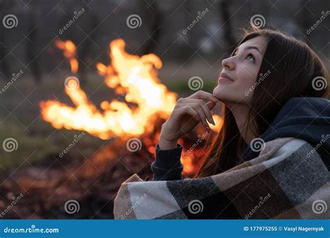 Dreamy Romantic Brunette Girl In Plaid Looking Up Big Campfire On The