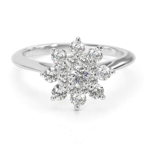 Anello a fiore in platino con diamanti e acquamarina. Tiffany & Co. Blooming Flower Ring in Platinum 0.60 ctw ...