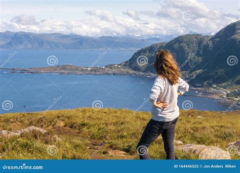 Girl Looking At The View From The Island Runde In Norway Stock Image