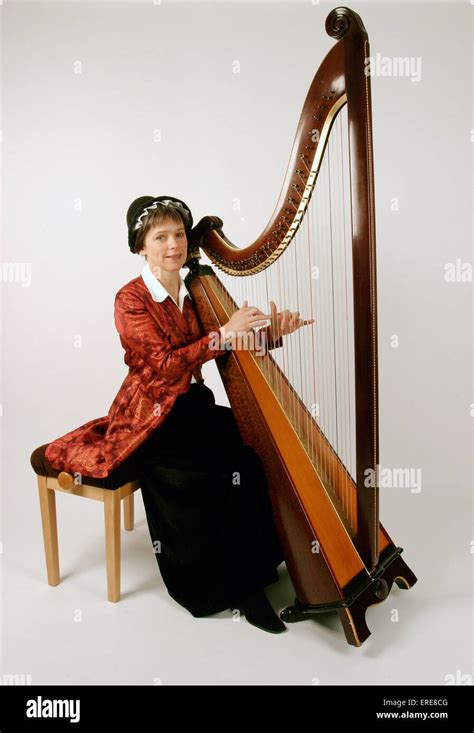 Welsh Triple Harp Being Played By Eluned Pierce Wearing Traditional