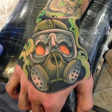Coloured Gas Mask Hand Tattoo Tattoomagz › Tattoo Designs Ink Works