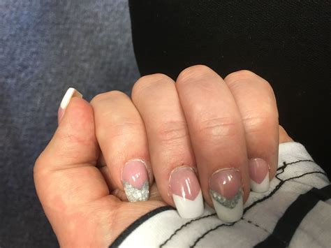 V Shaped French tip nails with a little glitter of course. | Sns nails