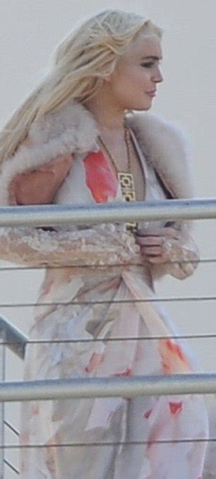 Lindsay Lohan Wardrobe Malfunction While Taking Photos Still Virgin