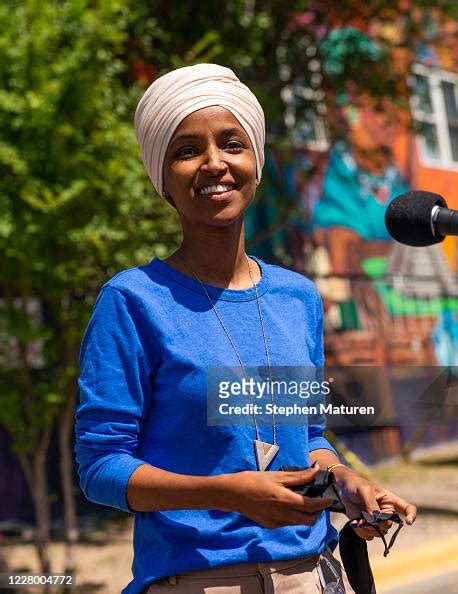 Rep Ilhan Omar Removes Her Mask To Speak With Media Gathered Outside