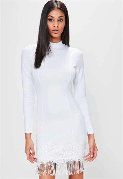 High neck white dress with sleeves. Missguided White Long Sleeve High Neck Tassel Hem Dress - Lyst