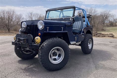 Sold Customized Willys Cj B Jeep With V Power Hemmings