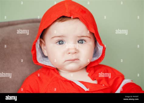 Closeup Portrait Of Cute Adorable Caucasian Upset Sad Baby Boy With