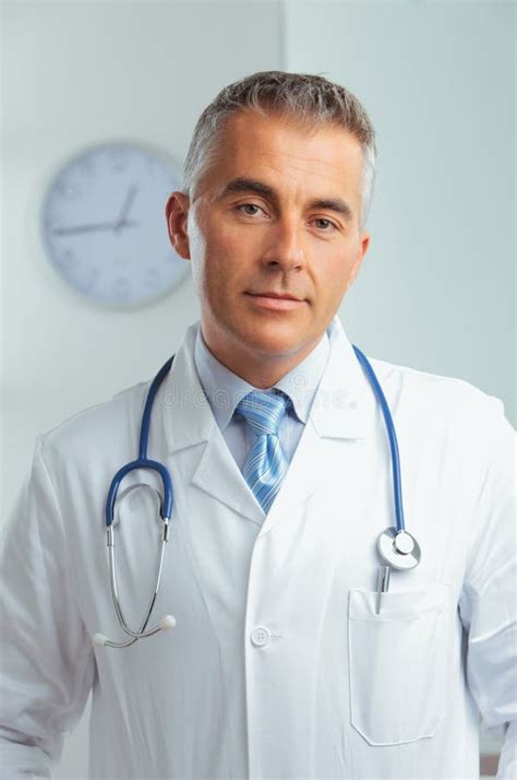 Portrait Of A Handsome Doctor Stock Photo Image Of Middle Coat 34620204