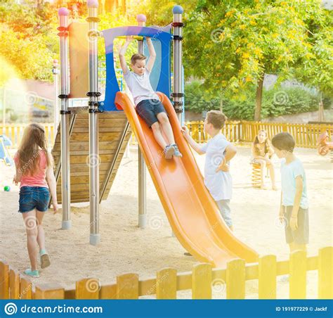Kids Playing On The Slide At Playground Stock Image Image Of Funny