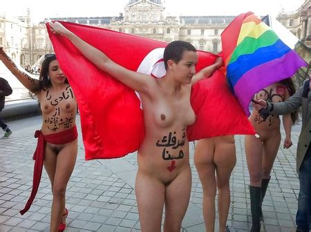 Female Protester Strips Completely Naked To Confront Riot Police At