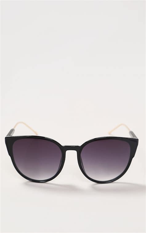 black sleek oversized cat eye sunglasses prettylittlething