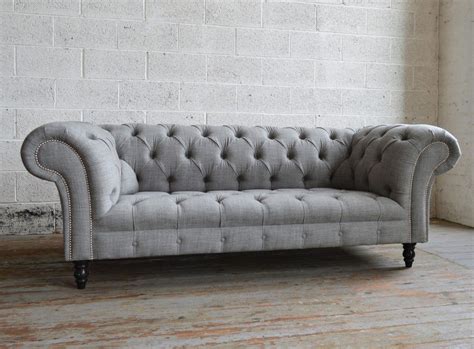 Featuring a low backrest, this sofa stands as a streamlined statement piece that can change the whole flow of your living room, creating an open, clean space. Chesterfield-Sofa - ROMFORD - Abode Sofas - Wolle / aus ...