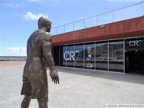 Cristiano ronaldo from real madrid poses during the unveiling ceremony of a statue of himself in his hometown of funchal, madeira island on december. Museu CR7 - Cristiano Ronaldo Museum on the Island of Madeira.